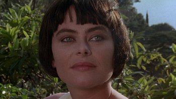 Movie still from “Enchanted April” (1991), directed by Mike Newell – A person with short hair; Close Up shot, Low angle
