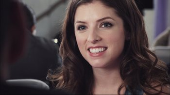 Movie still from “End of Watch” (2012), directed by David Ayer – A person with a smile on their face; Close Up shot, Over the shoulder angle