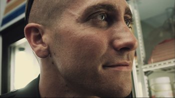Movie still from “End of Watch” (2012), directed by David Ayer – A man's head and face; Close Up shot, Low angle