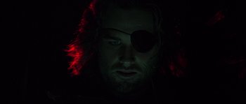 Movie still from “Escape from New York” (1981), directed by John Carpenter – A person wearing a eye patch; Close Up shot, Low angle