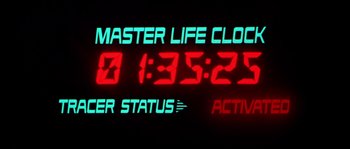 Movie still from “Escape from New York” (1981), directed by John Carpenter – A digital clock that reads 3 : 3 5 : 2 5; Extreme Close Up shot, Low angle