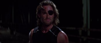 Movie still from “Escape from New York” (1981), directed by John Carpenter – A person wearing a eye patch; Close Up shot, Low angle
