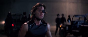 Movie still from “Escape from New York” (1981), directed by John Carpenter – A person wearing a eye patch; Close Up shot, Low angle