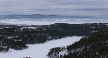 Movie still from “Essential Killing” (2010), directed by Jerzy Skolimowski – A view of a valley with snow on the ground; Extreme Wide shot, High angle