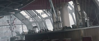 Movie still from “The Quake” (2018), directed by John Andreas Andersen – A bar with many lights hanging from the ceiling; Wide shot, Low angle