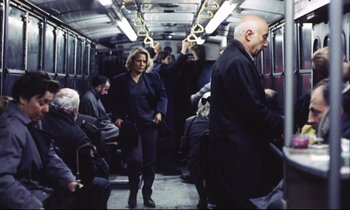 Movie still from “Eternity and a Day” (1998), directed by Theodoros Angelopoulos – A man and a woman on a subway train; Wide shot, Over the shoulder angle