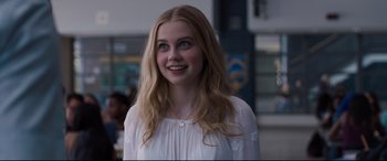 Movie still from “Every Day” (2018), directed by Michael Sucsy – A woman with long blonde hair wearing a white shirt; Close Up shot, Over the shoulder angle