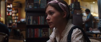 Movie still from “Every Day” (2018), directed by Michael Sucsy – A woman with a headband looking to her left; Close Up shot, Over the shoulder angle