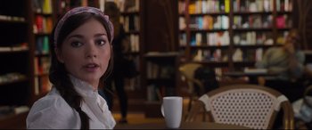 Movie still from “Every Day” (2018), directed by Michael Sucsy – A woman sitting at a table with a cup of coffee; Close Up shot, Over the shoulder angle