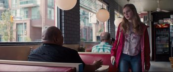 Movie still from “Every Day” (2018), directed by Michael Sucsy – A man and a woman sitting at a restaurant; Medium shot, Over the shoulder angle
