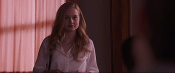 Movie still from “Every Day” (2018), directed by Michael Sucsy – A woman with long blonde hair wearing a white shirt; Close Up shot, Over the shoulder angle