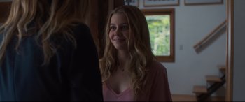 Movie still from “Every Day” (2018), directed by Michael Sucsy – A young woman is looking into a mirror; Close Up shot, Over the shoulder angle