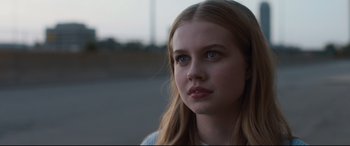 Movie still from “Every Day” (2018), directed by Michael Sucsy – A young girl with long blonde hair looking to her left; Close Up shot, Low angle