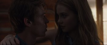 Movie still from “Every Day” (2018), directed by Michael Sucsy – A man and a woman face to face in the dark; Close Up shot, Over the shoulder angle