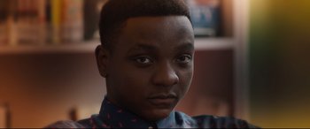 Movie still from “Every Day” (2018), directed by Michael Sucsy – A person wearing a blue shirt; Close Up shot, Low angle