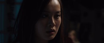 Movie still from “Every Day” (2018), directed by Michael Sucsy – A woman's face in the dark; Close Up shot, Over the shoulder angle