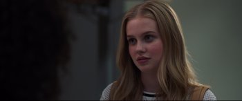 Movie still from “Every Day” (2018), directed by Michael Sucsy – A young woman with long blonde hair looking at the camera; Close Up shot, Over the shoulder angle