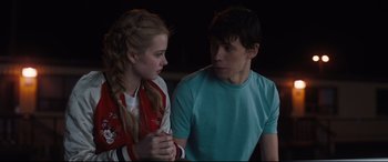 Movie still from “Every Day” (2018), directed by Michael Sucsy – A man and a woman sitting next to each other; Medium shot, Over the shoulder angle