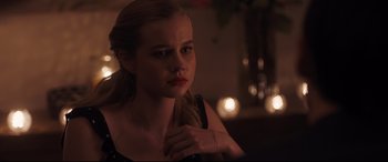 Movie still from “Every Day” (2018), directed by Michael Sucsy – A young blonde woman is looking into the distance; Close Up shot, Over the shoulder angle