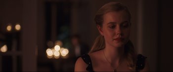 Movie still from “Every Day” (2018), directed by Michael Sucsy – A woman in a black dress is looking at the camera; Close Up shot, Over the shoulder angle