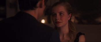 Movie still from “Every Day” (2018), directed by Michael Sucsy – A young woman looking at a young man in a dark room; Close Up shot, Over the shoulder angle