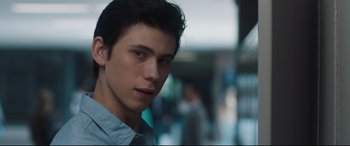 Movie still from “Every Day” (2018), directed by Michael Sucsy – A person wearing a blue shirt; Close Up shot, Over the shoulder angle
