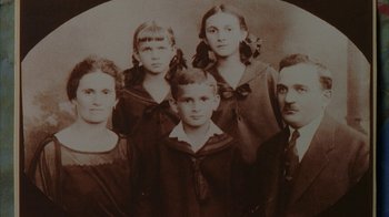 Movie still from “Everything Is Illuminated” (2005), directed by Liev Schreiber – An old photo of a group of people; Extreme Close Up shot, High angle
