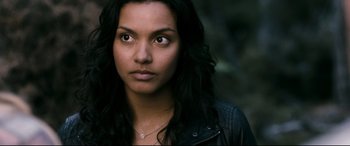 Movie still from “Evil Dead” (2013), directed by Fede Alvarez – A person wearing a black jacket; Close Up shot, High angle