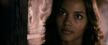 Movie still from “Evil Dead” (2013), directed by Fede Alvarez – A woman's eyes and face; Close Up shot, Over the shoulder angle