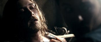 Movie still from “Evil Dead” (2013), directed by Fede Alvarez – A person brushing his hair; Close Up shot, Over the shoulder angle