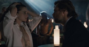 Movie still from “Exotica” (1994), directed by Atom Egoyan – A man and a woman in front of each other in a room; Medium shot, Over the shoulder angle