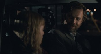 Movie still from “Exotica” (1994), directed by Atom Egoyan – A man and a little girl sitting in a car; Close Up shot, Over the shoulder angle