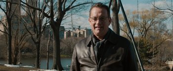 Movie still from “Extremely Loud & Incredibly Close” (2011), directed by Stephen Daldry – A person wearing a leather jacket near a body of water; Close Up shot, Over the shoulder angle