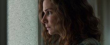 Movie still from “Extremely Loud & Incredibly Close” (2011), directed by Stephen Daldry – A person looking out of a window; Close Up shot, Low angle