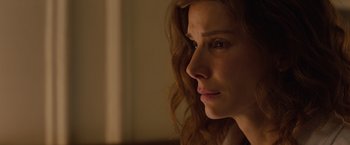 Movie still from “Extremely Loud & Incredibly Close” (2011), directed by Stephen Daldry – A person with long brown hair; Close Up shot, Low angle