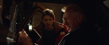 Movie still from “Extremely Loud & Incredibly Close” (2011), directed by Stephen Daldry – An older man and a young boy looking at each other; Close Up shot, Over the shoulder angle