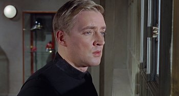 Movie still from “Fahrenheit 451” (1966), directed by François Truffaut – A person wearing a black shirt; Close Up shot, Low angle