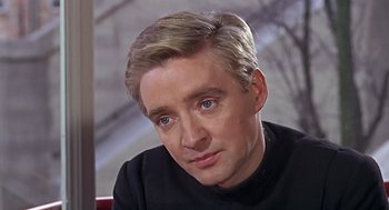 Movie still from “Fahrenheit 451” (1966), directed by François Truffaut – A person wearing a black shirt; Close Up shot, Over the shoulder angle