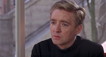 Movie still from “Fahrenheit 451” (1966), directed by François Truffaut – A person wearing a black shirt; Close Up shot, Over the shoulder angle