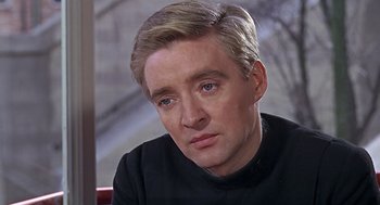 Movie still from “Fahrenheit 451” (1966), directed by François Truffaut – A person wearing a black shirt; Close Up shot, Over the shoulder angle