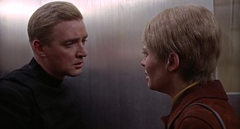 Movie still from “Fahrenheit 451” (1966), directed by François Truffaut – A man and a woman are looking at each other; Close Up shot, Low angle