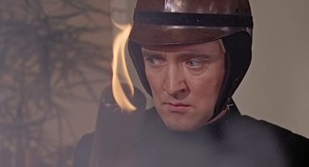Movie still from “Fahrenheit 451” (1966), directed by François Truffaut – A person wearing a helmet; Close Up shot, Over the shoulder angle