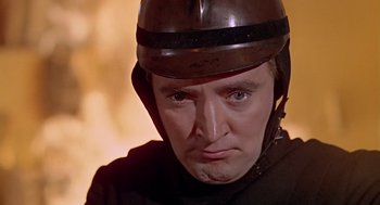 Movie still from “Fahrenheit 451” (1966), directed by François Truffaut – A person wearing a helmet; Close Up shot, Low angle