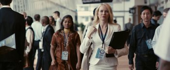 Movie still from “Fair Game” (2010), directed by Doug Liman – A woman walking down the street with a folder in her hand; Medium shot, Low angle