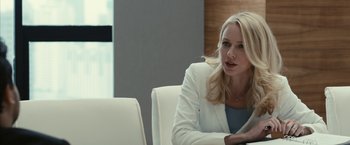 Movie still from “Fair Game” (2010), directed by Doug Liman – A woman sitting at a table in front of a laptop; Close Up shot, Over the shoulder angle