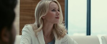 Movie still from “Fair Game” (2010), directed by Doug Liman – A woman with long blonde hair wearing a white jacket; Close Up shot, Low angle