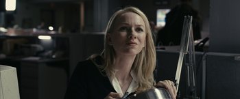 Movie still from “Fair Game” (2010), directed by Doug Liman – A woman with blond hair is holding a pan; Close Up shot, Low angle