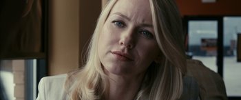 Movie still from “Fair Game” (2010), directed by Doug Liman – A person with blonde hair and blue eyes; Close Up shot, Over the shoulder angle