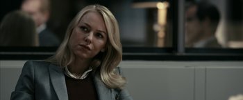 Movie still from “Fair Game” (2010), directed by Doug Liman – A woman with long blonde hair sitting on a bench; Close Up shot, Over the shoulder angle