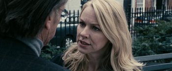 Movie still from “Fair Game” (2010), directed by Doug Liman – A woman with long blonde hair talking to a man; Close Up shot, Over the shoulder angle
